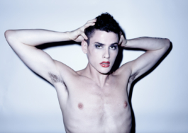 Photography. Portrait. Shirtless man with red lipstick 