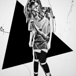 Art direction. Photography black & white. Model wears a printed silk dress. 