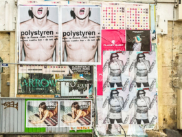 photography. A wall full of Polystyren posters in a street in Paris. 