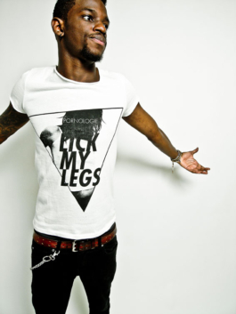 Photography. Fashion editorial. model wear a white printed t-shirt. Lick my legs logo 