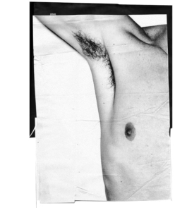 Art direction. Unshaved armpit close up. Black and white photo. 