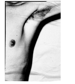 Art direction. Unshaved armpit close up. Black and white photo. 